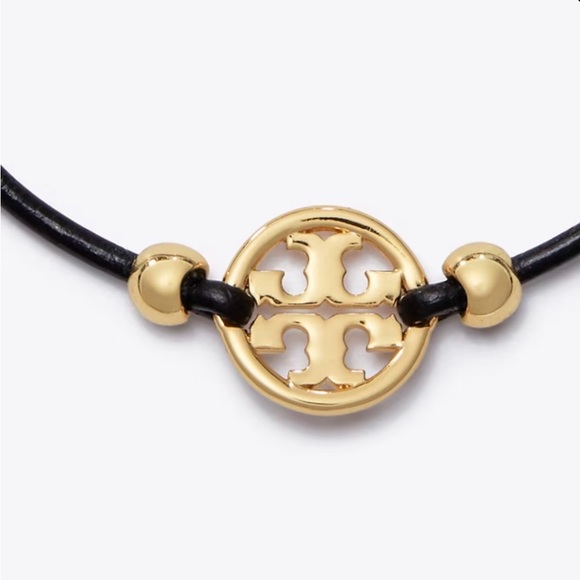 Elegant Gold and Black Emblem Bracelet - Picture 2 of 4